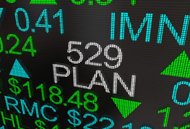 Digital stock market ticker showing "529 Plan" among various financial data, including numbers and upward/downward arrows.